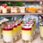 delicious-desserts-in-shot-glasses-on-buffet-table_1262-1797