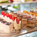 delicious-mini-cakes-on-buffet-table_1262-1801